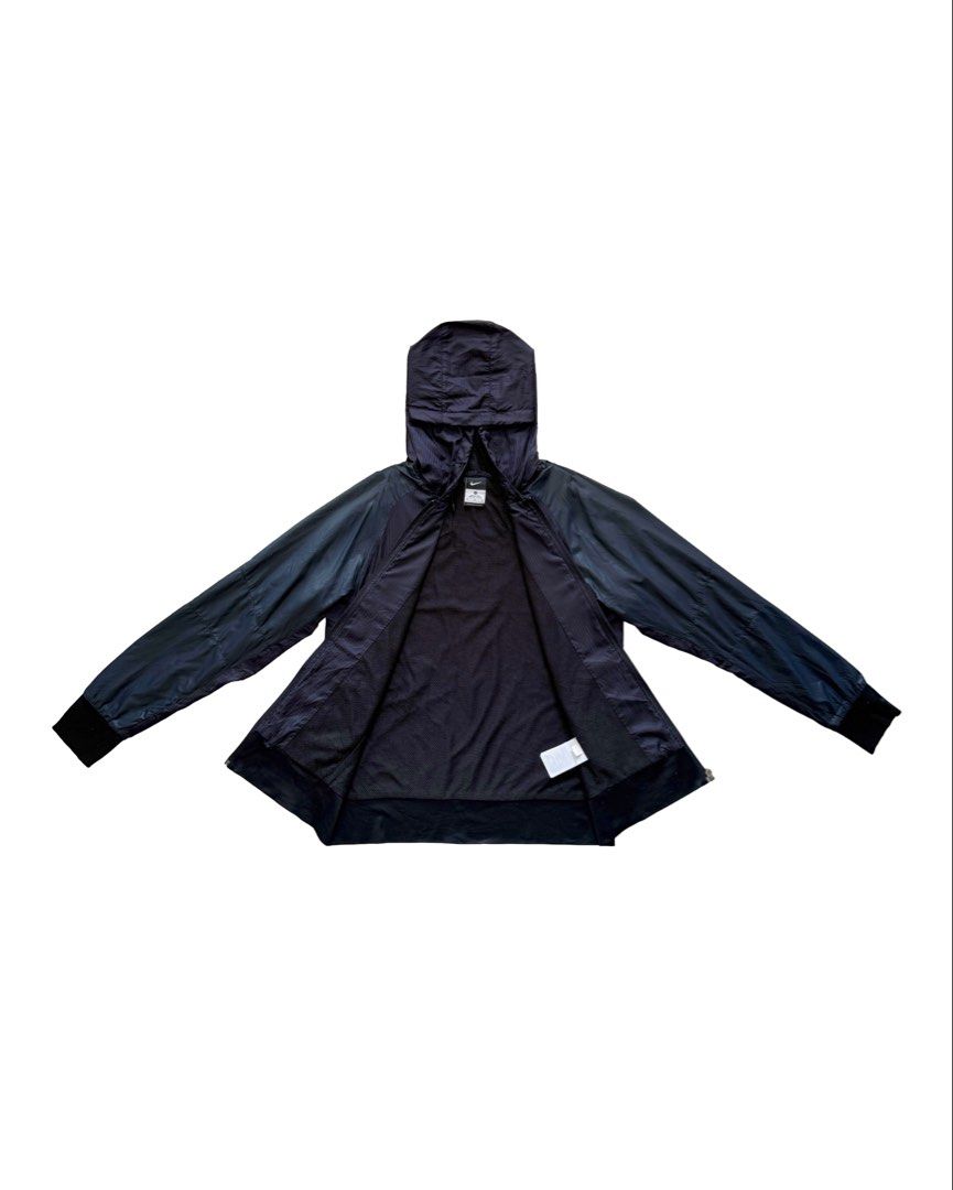 Nike Hooded Jacket (Category: Coats, Jackets and Outerwear) located in Manila. Submitted by morf_sply (Listing ID 1464301488, Image 3). Description: Regular fit jacket with an adjustable hood, long sleeves with ribbed cuffs, welt pockets at the hip and ribbed hem. Zip-up front. Broken puller. M on tag. Shoulder Width 18 in Pit to Pit19 in Length 25 in Sleeves 23 in.