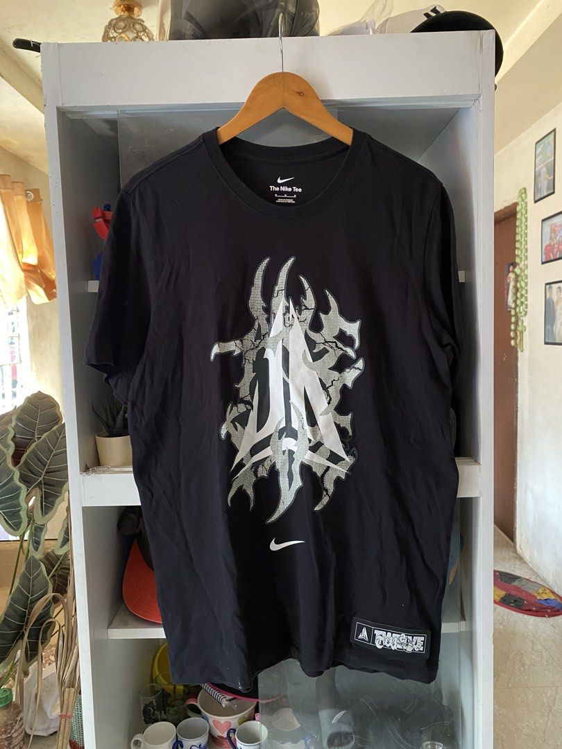 NIKE JA MORANT (Category: Tshirts & Polo Shirts ) located in Manaoag. Submitted by mangthrifttayo (Listing ID 1464195022, Image 1). Description: JA MORANT X NIKE SIZE M (21x28) No issue 10/10 overall condition .