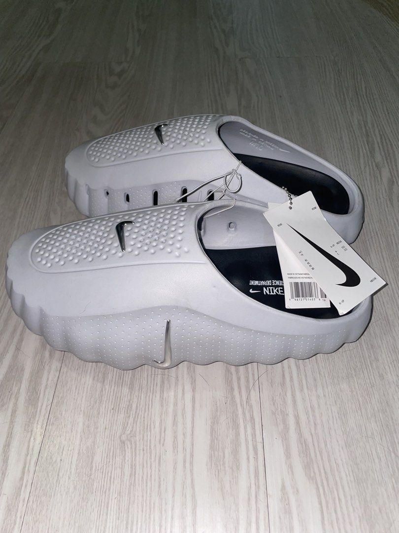 Nike Mind Science Experiment Clogs White/Black (Category: Slippers & Slides) located in Caloocan City. Submitted by groves47 (Listing ID 1464301170, Image 3). Description: - Nike Mind Science Experiment Clogs - Available in White and Black - Slip-on style for easy wear - Perforated top for enhanced breathability - Brand new with tags attached - Ideal for casual everyday use.