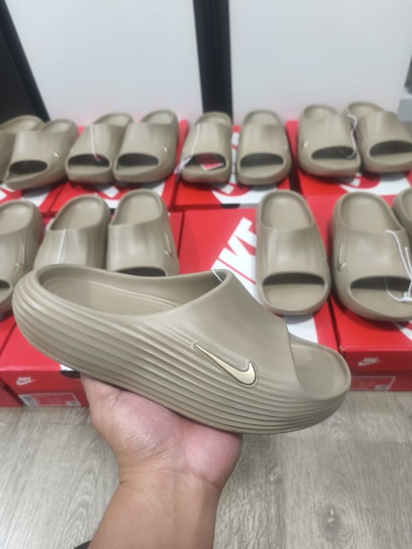 Nike Rejuven8 Slide Khaki (Category: Slippers & Slides) located in Manila. Submitted by brts_27 (Listing ID 1464299766, Image 1). Description: Selling !! Nike Rejuven8 Slide " Khaki" Size 7 (2) Size 8(2) Size 9(2) Size 10 Brand New Price: 2,150.00 only Location: Santa Ana Manila / Binondo Manila.