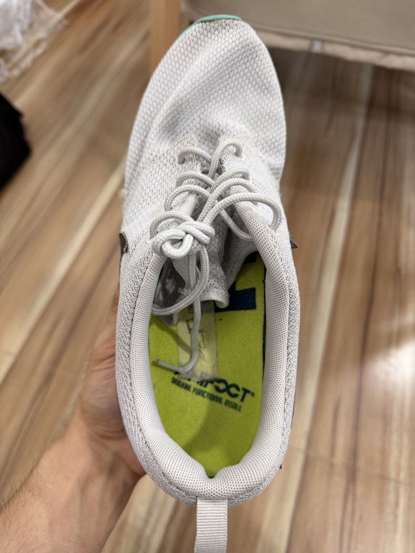 Nike Roshe Run Grey Teal Sneakers (Category: Sneakers) located in Pasig City. Submitted by cheesemate8888888 (Listing ID 1464176342, Image 1). Description: - Grey Nike Roshe Run sneakers - Teal sole - Breathable mesh upper - Comfortable insoles - Ideal for everyday wear or light workouts.
