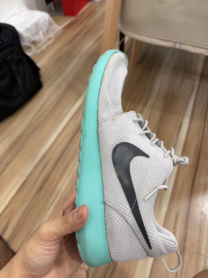 Nike Roshe Run Grey Teal Sneakers (Category: Sneakers) located in Pasig City. Submitted by cheesemate8888888 (Listing ID 1464176342, Image 3). Description: - Grey Nike Roshe Run sneakers - Teal sole - Breathable mesh upper - Comfortable insoles - Ideal for everyday wear or light workouts.