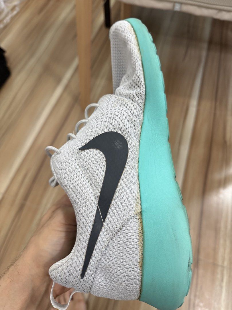 Nike Roshe Run Grey Teal Sneakers (Category: Sneakers) located in Pasig City. Submitted by cheesemate8888888 (Listing ID 1464176342, Image 2). Description: - Grey Nike Roshe Run sneakers - Teal sole - Breathable mesh upper - Comfortable insoles - Ideal for everyday wear or light workouts.