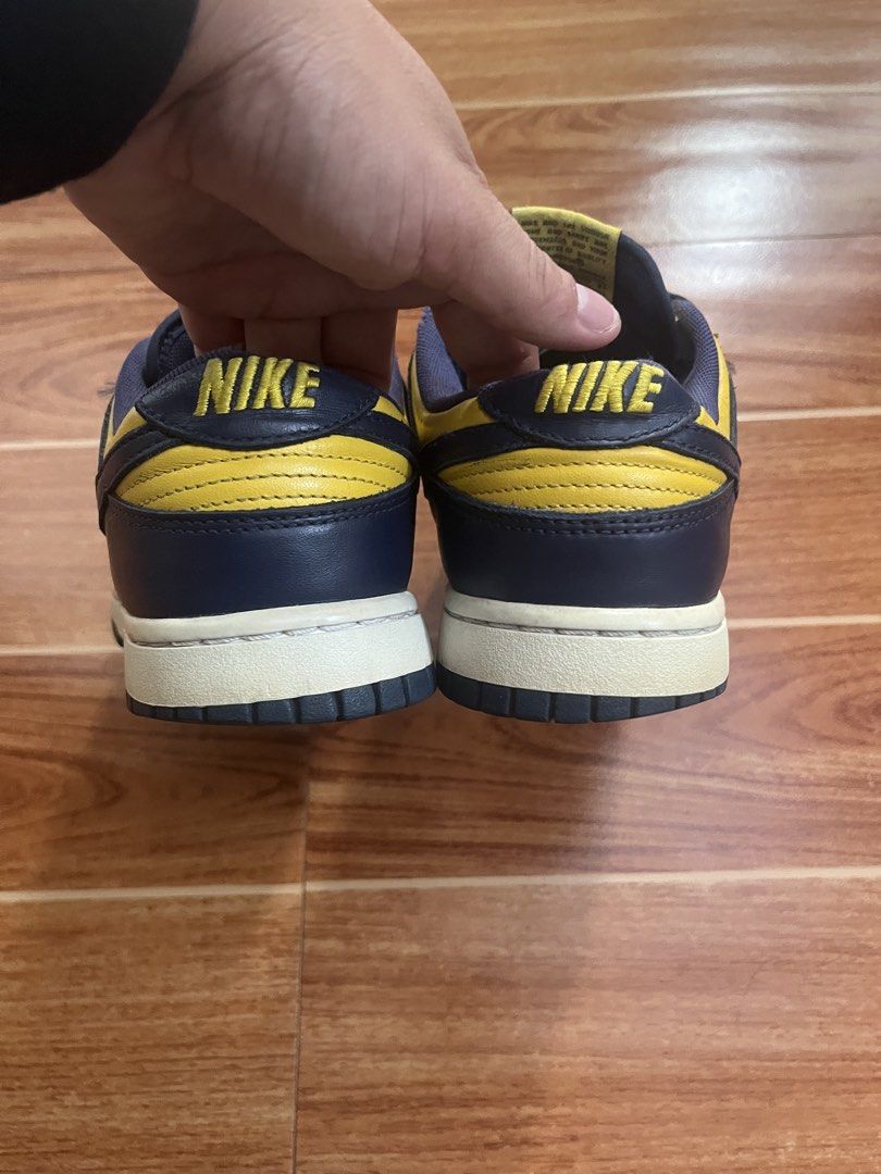 Nike SB Dunk Low Navy Yellow “Michigan Wolverines” (Category: Sneakers) located in Manila. Submitted by stmngo (Listing ID 1464147803, Image 3). Description: NIKE SB DUNK LOW “Michigan Wolverines” Size 8.5 US mens | EUR 42 | 26.5 cm Minimal tear sockliner (See last photo) Good Condition Original / Legit 📍Manage your expectation. Shoes is used hut not abused. .