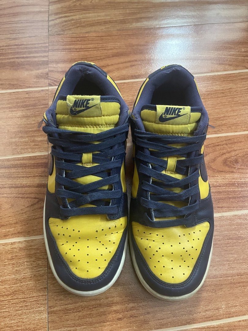 Nike SB Dunk Low Navy Yellow “Michigan Wolverines” (Category: Sneakers) located in Manila. Submitted by stmngo (Listing ID 1464147803, Image 2). Description: NIKE SB DUNK LOW “Michigan Wolverines” Size 8.5 US mens | EUR 42 | 26.5 cm Minimal tear sockliner (See last photo) Good Condition Original / Legit 📍Manage your expectation. Shoes is used hut not abused. .