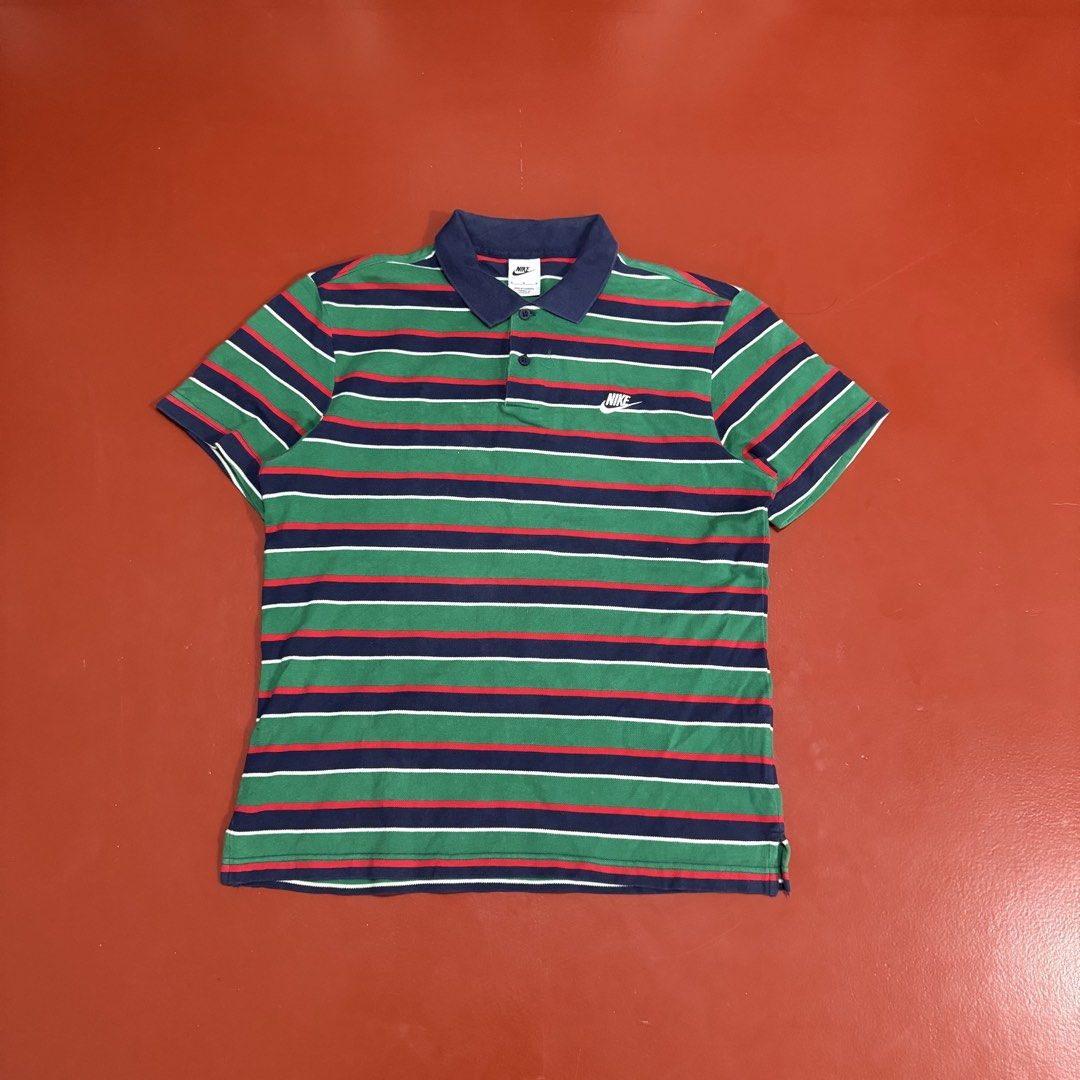 NIKE STRIPES POLO SHIRT (Category: Tshirts & Polo Shirts ) located in Pasig City. Submitted by buzzthrifty (Listing ID 1464264730, Image 3). Description: SIZE M-L 21x25 EXCELLENT CONDITION.