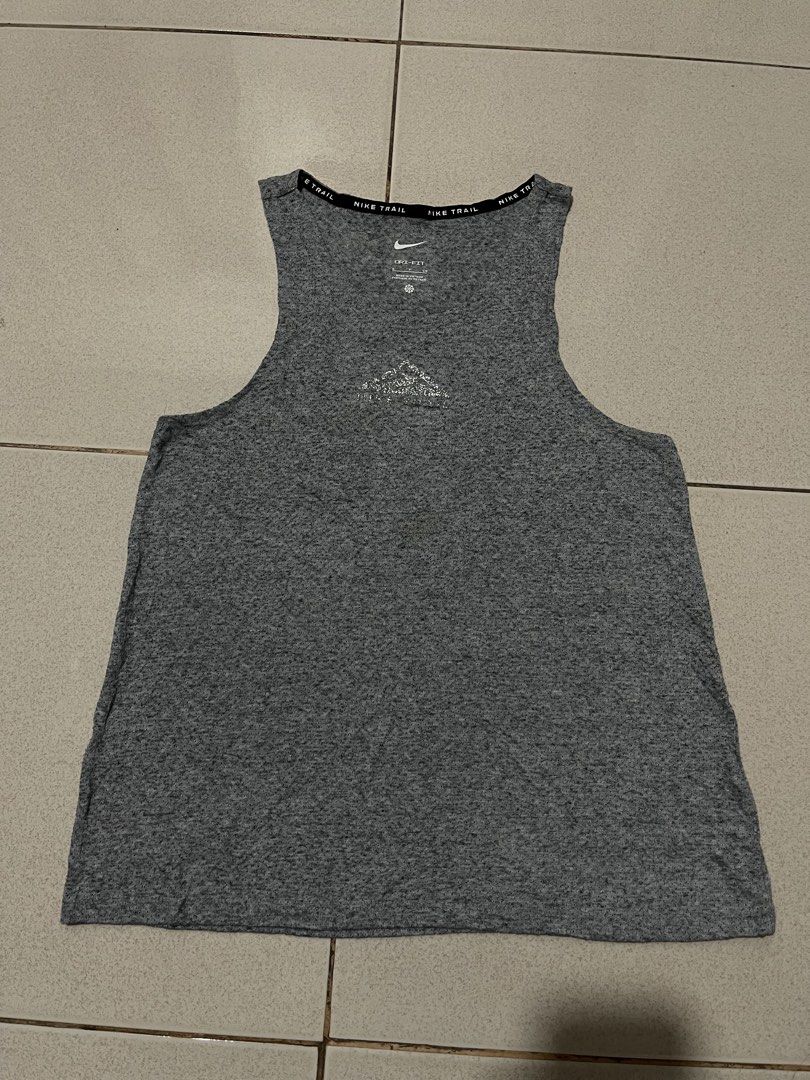 Nike Trail Running Tank Top (Category: Activewear) located in Cavite. Submitted by s1nglest1tch.ph (Listing ID 1464271155, Image 3). Description: Authentic ✅ Size small on tag 16 width 23.5 length Excellent used condition Cut wash tag 10/10 color rate.