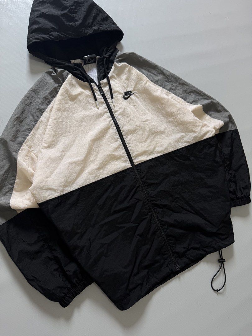 NIKE TRITONE WIND BREAKER (Category: Coats, Jackets and Outerwear) located in Cavite. Submitted by chooseyouroutfit (Listing ID 1464306543, Image 1). Description: NIKE TRITONE WIND BREAKER Tight ribbings Wind breaker Length - 27 Width 25.5 Excellent condition Issue: small scratch Check detailed pictures .