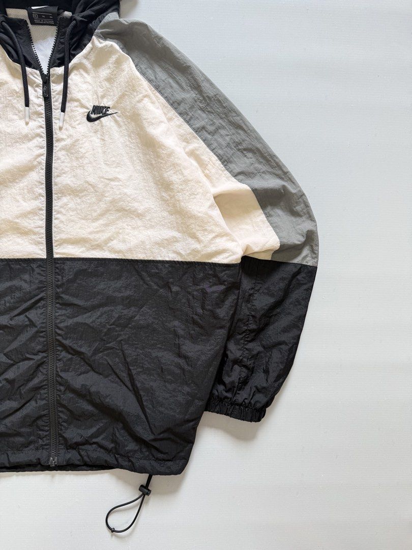 NIKE TRITONE WIND BREAKER (Category: Coats, Jackets and Outerwear) located in Cavite. Submitted by chooseyouroutfit (Listing ID 1464306543, Image 3). Description: NIKE TRITONE WIND BREAKER Tight ribbings Wind breaker Length - 27 Width 25.5 Excellent condition Issue: small scratch Check detailed pictures .