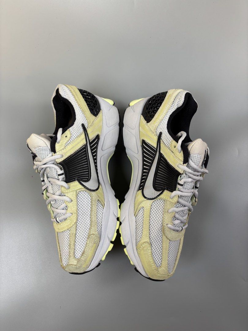 Nike Vomero 5 "Photon Dust" "Light Lemon Twist" (Category: Sneakers) located in Cagayan de Oro. Submitted by klebertaco53763 (Listing ID 1464159935, Image 3). Description: - Nike Vomero 5 - Colorway: Photon Dust and Light Lemon Twist - Materials: Breathable mesh upper with premium suede overlays - Accents: Stylish black and silver details - Features: Unique textured heel counter for added flair - Laces: Clean white laces - Versatile: Ideal for bo