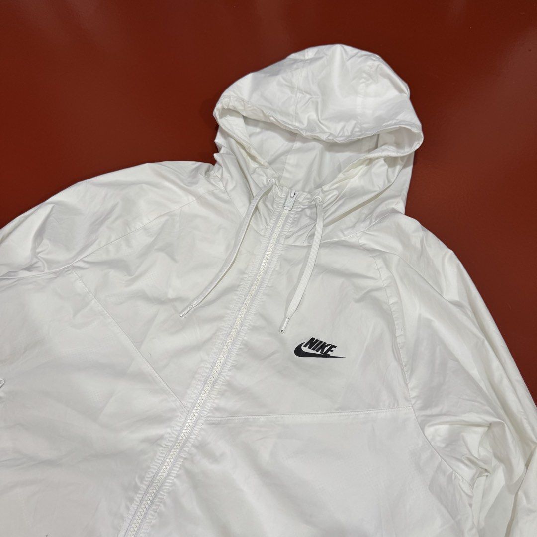 NIKE WINDBREAKER (Category: Coats, Jackets and Outerwear) located in Pasig City. Submitted by buzzthrifty (Listing ID 1464246907, Image 2). Description: SIZE L-XL 22x25 VG CONDITION LAST PIC ISSUE NEEDS WSH .