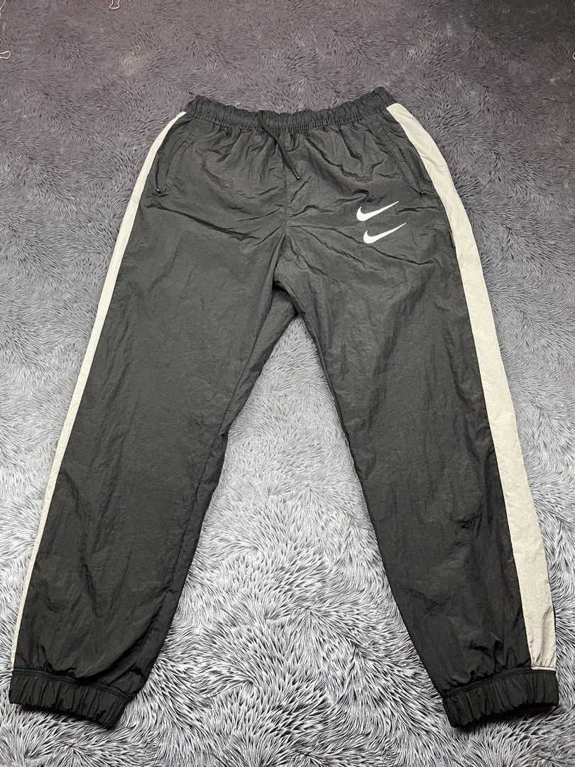 Nike woven nylon multi swoosh (Category: Joggers) located in Iloilo. Submitted by thefilthythrift (Listing ID 1464323734, Image 1). Description: .