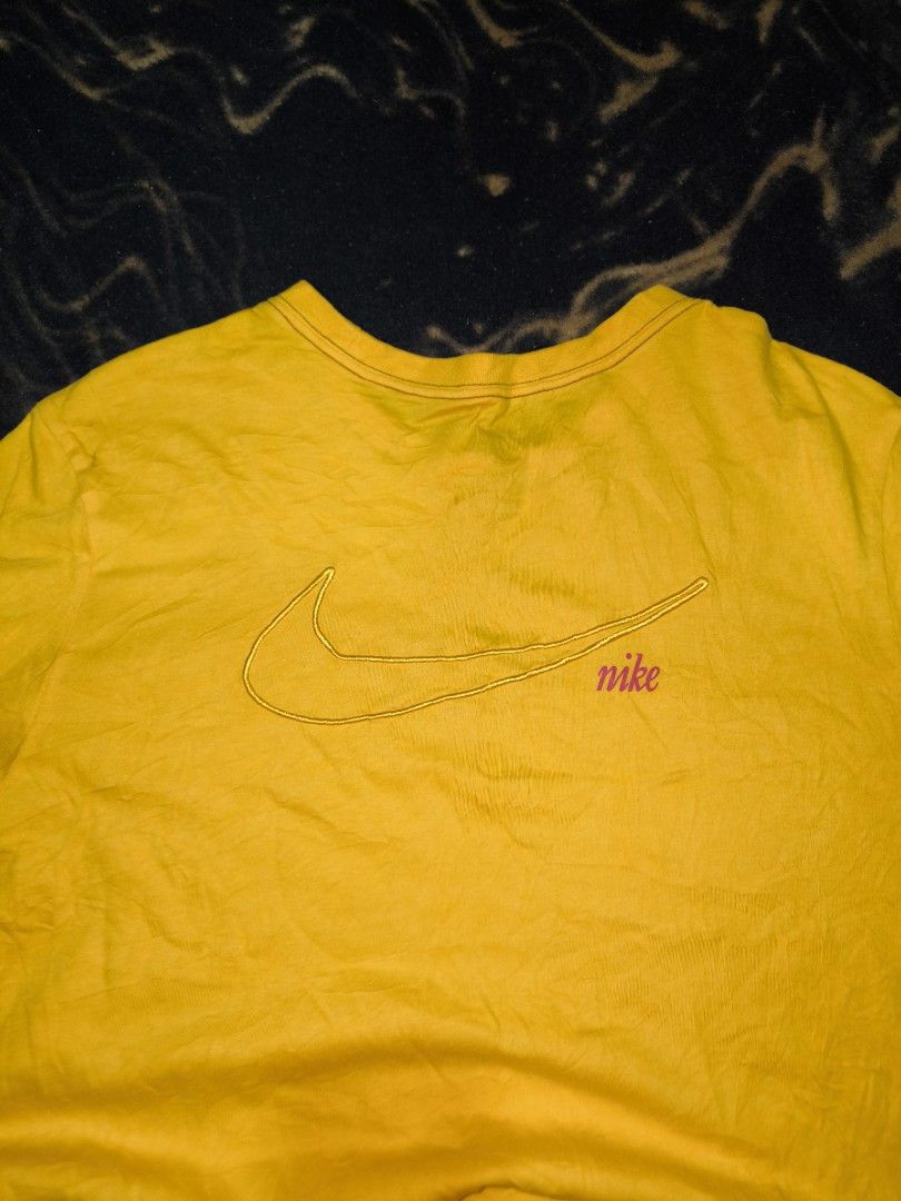 Nike Yellow Tee (Category: Tshirts & Polo Shirts ) located in Manila. Submitted by fljaoti27 (Listing ID 1464255636, Image 3). Description: Nike Tee Medium Issue 2 pin hole.