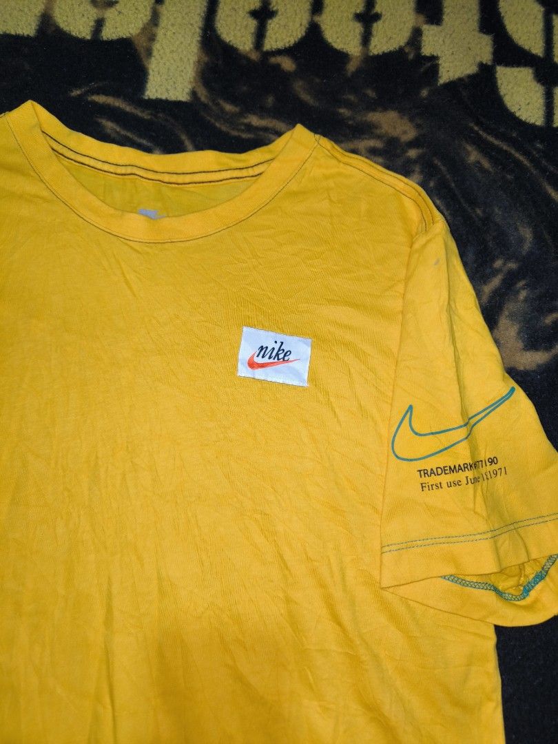 Nike Yellow Tee (Category: Tshirts & Polo Shirts ) located in Manila. Submitted by fljaoti27 (Listing ID 1464255636, Image 2). Description: Nike Tee Medium Issue 2 pin hole.