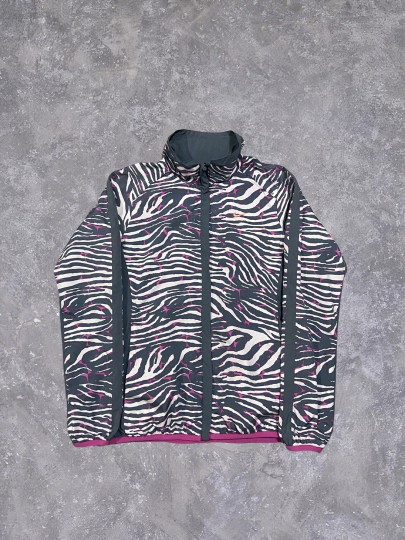 Nike Windbreaker Zebra size Small Womens (Category: Coats, Jackets and Outerwear) located in Baguio. Submitted by chicoroy (Listing ID 1464304068, Image 1). Description: Nike Windbreaker Size S Womens Dimes:18/23.5 No issue need wash only Excellent Condition Baguio City location can ship JNT.