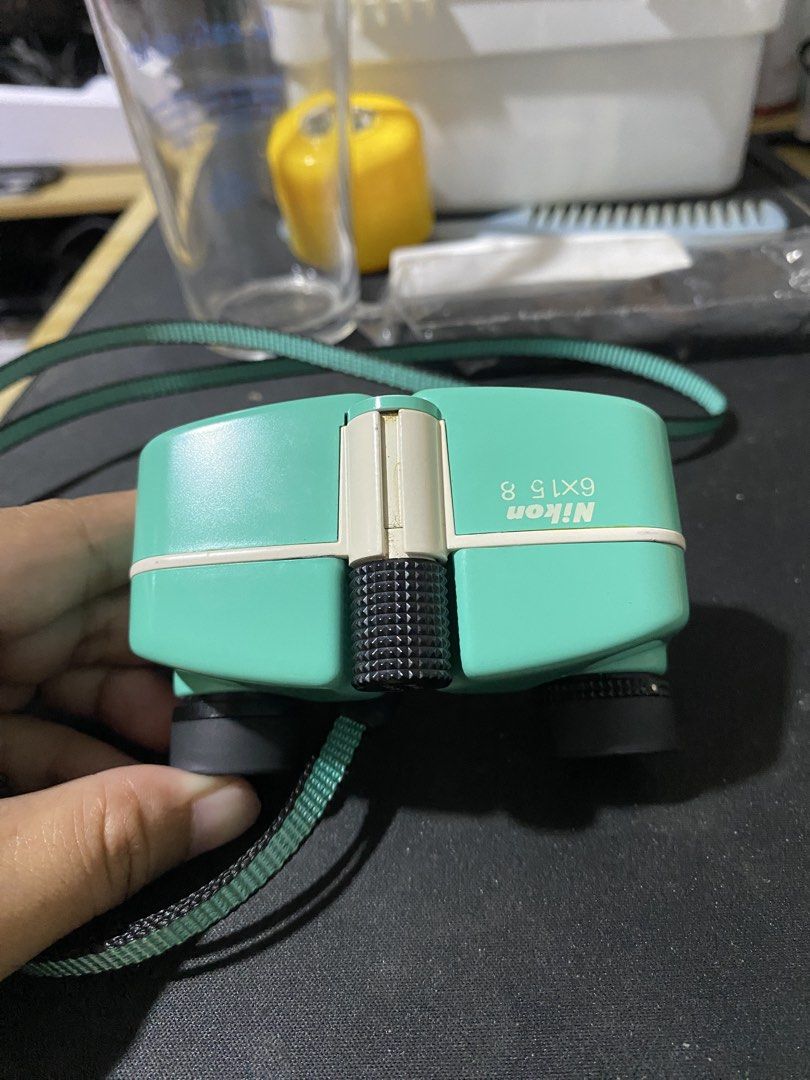 Nikon 6x15 8 Compact Binoculars Teal (Category: Hiking & Camping) located in Manila. Submitted by cdb_22 (Listing ID 1464187966, Image 2). Description: - Teal Nikon 6x15 8 binoculars - Compact and lightweight design - Easy to carry, perfect for on-the-go - Ideal for outdoor activities and bird watching - In good working condition - Comes with a strap.