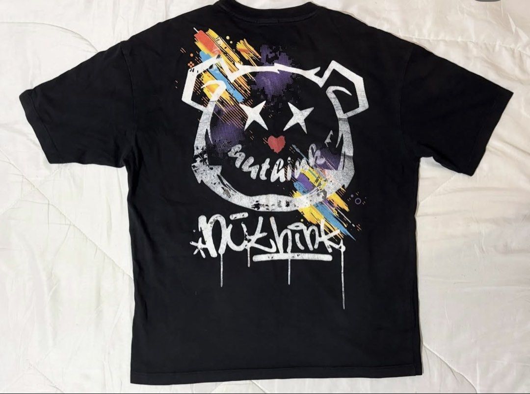 Nuthink Black Graphic T-shirt (Category: Tshirts & Polo Shirts ) located in Caloocan City. Submitted by mmc1999 (Listing ID 1464294397, Image 2). Description: - Black Nuthink graphic t-shirt - Size: Large - Features a cool bear graphic on the front - Larger graphic design on the back - Ideal for everyday casual wear.