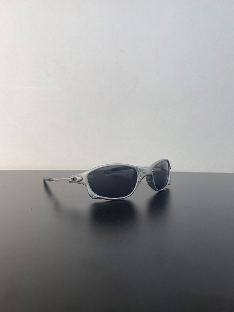 Oakley Juliet (Category: Sunglasses & Eyewear) located in Manila. Submitted by mine2ownit (Listing ID 1464227815, Image 3). Description: - Sleek silver frame - Dark, classic lenses - Timeless design, perfect for daily wear.