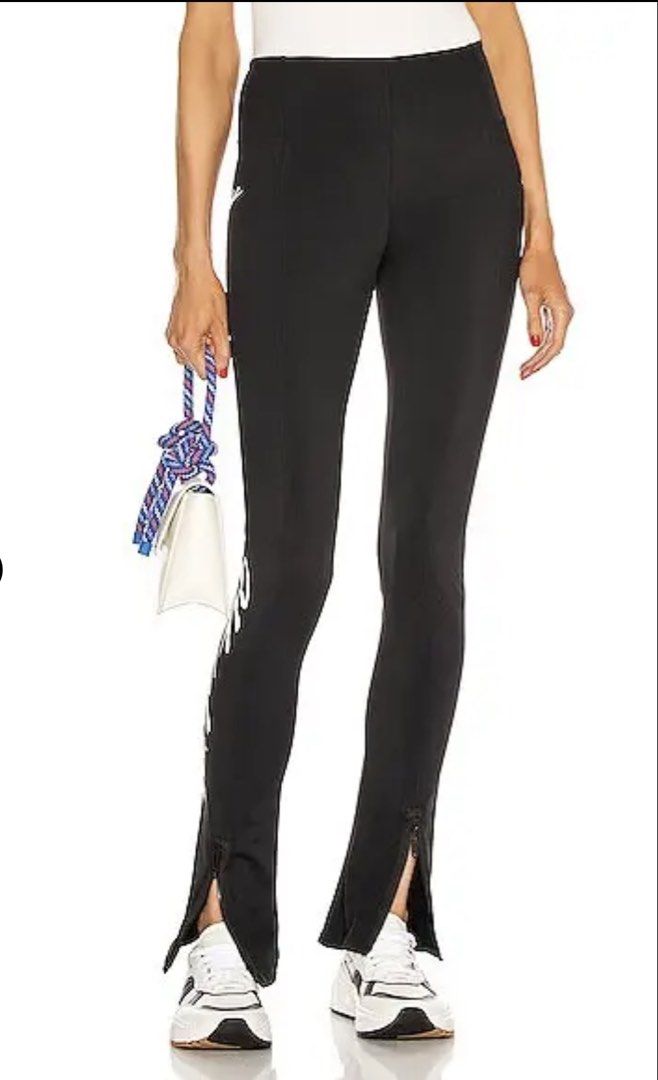 OFF-WHITE Athleisure Split Legging Black White (Category: Luxury Apparel) located in Butuan. Submitted by slownsteady_ (Listing ID 1464279659, Image 3). Description: - Brand: OFF-WHITE - Style: Athleisure Split Legging - Color: Black & White - Material: Nylon fabric - Features: Wide elastic waistband, rubberized screen print logo detail on sides, zip closure at hem - Fit: Stretch fit - Care: Hand wash - Product Code: OWVGO13R21JER0011001.