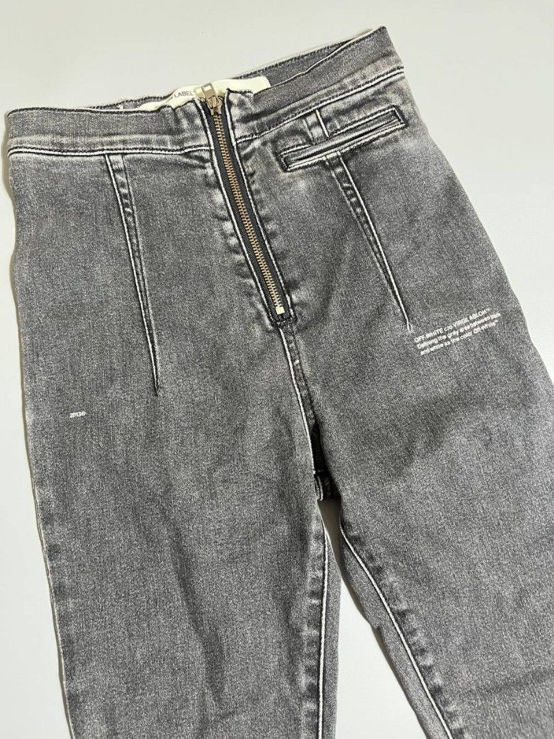 OFF-WHITE "DENIM LABEL" Grey Zipper Jeans (Category: Jeans) located in Lucena. Submitted by sth.archvl (Listing ID 1464190467, Image 3). Description: In great condition No flaws Size small Size small Measurements Waist 12 Length 33 Leg opening 5 Front rise 12.5.