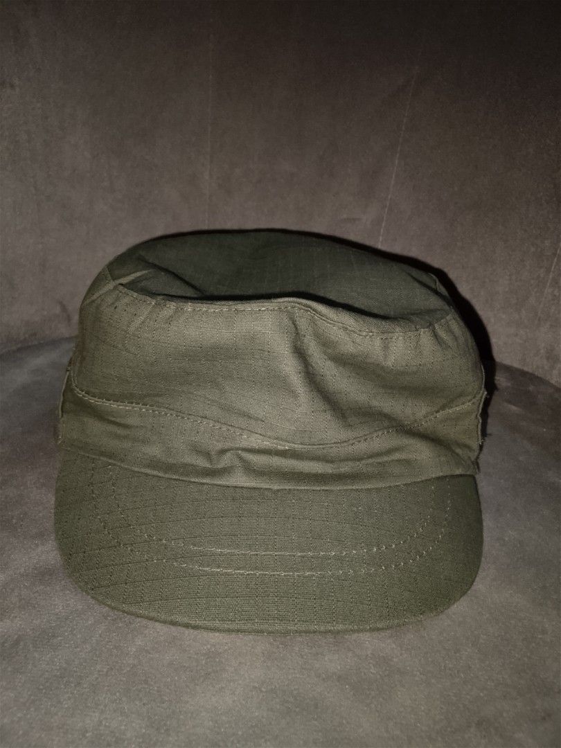Olive Green Cadet Flat Top Hat with Floral Interior (Category: Hats & Beanies) located in Binangonan. Submitted by yuristalin888 (Listing ID 1464309034, Image 2). Description: Add a touch of utility style with a hidden feminine flair to your wardrobe with this stylish olive green cadet cap. Featuring a classic flat-top military silhouette, durable exterior fabric, and adjustable side strap details, this hat combines rugged structure with charming