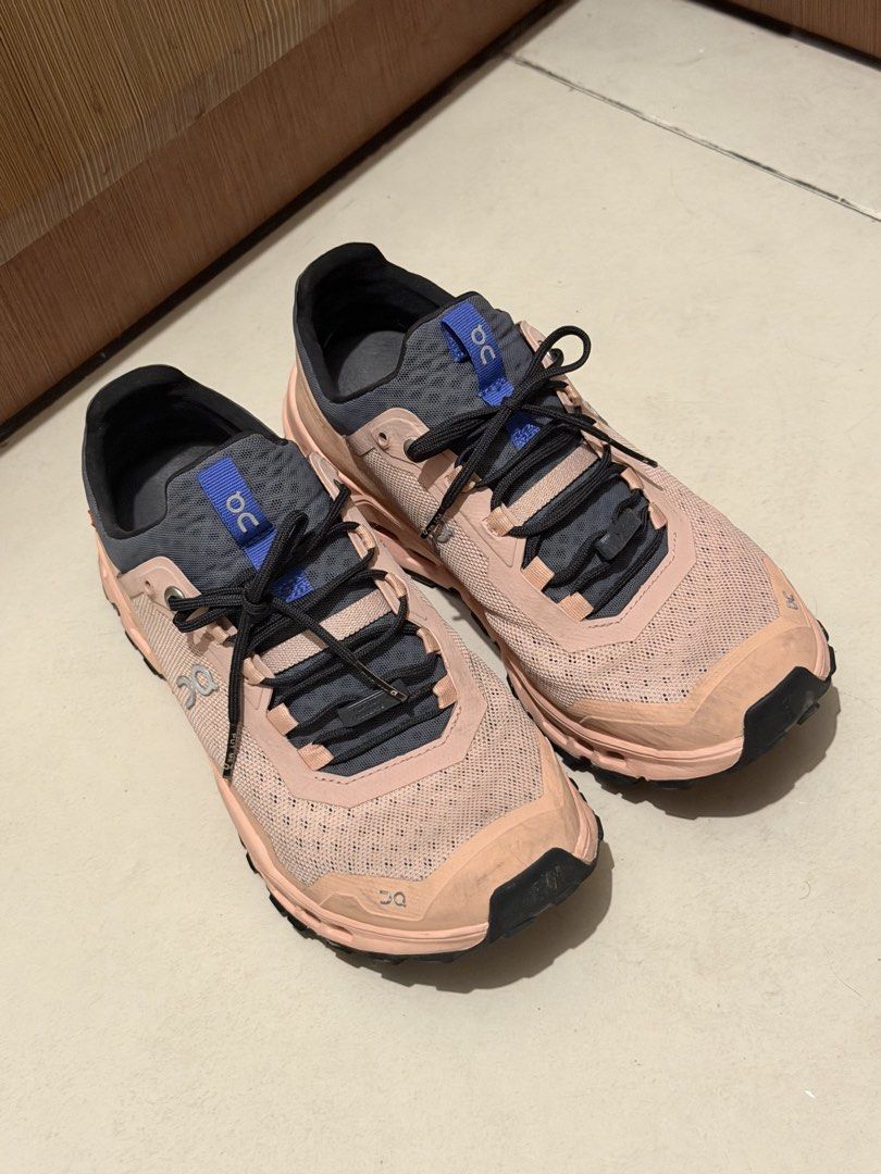 On Cloud Waterproof Running Shoes - Pink/Grey (Category: Sneakers) located in Manila. Submitted by mengxir20193848 (Listing ID 1464191011, Image 1). Description: - On Cloud running shoes in pink and grey - Waterproof design, perfect for any weather - Ideal for trail running or everyday wear - Features black laces and a high-grip sole - Minor scuffs on the toe area, but plenty of wear left.