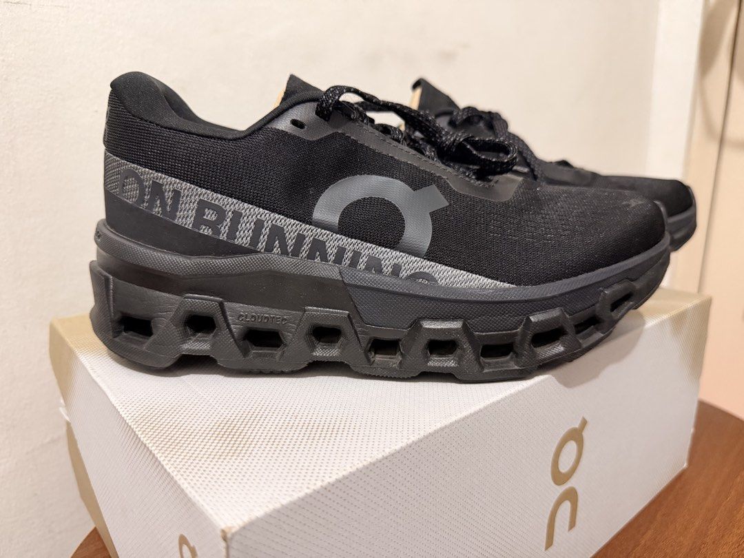 ON Cloudmonster 2 Running Shoes - Black (Category: Sneakers) located in Valenzuela. Submitted by aleya.ncl (Listing ID 1464197239, Image 2). Description: - ON Cloudmonster 2 - Color: Black - Size: US W 6.5 - Condition: Good as New (Used twice) - Ideal for: Running & Everyday shoes - Features: Lightweight, Comfortable - Includes: Original Box.