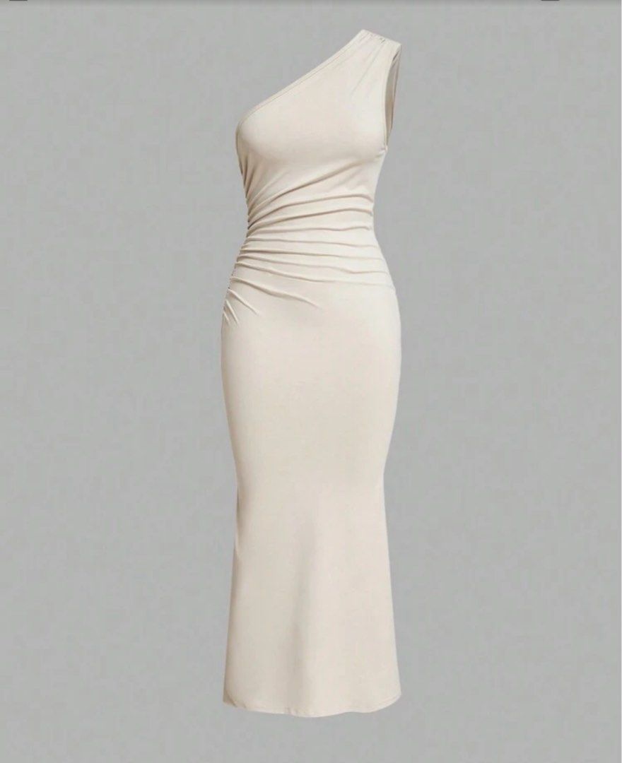 One Shoulder Ruched Midi Dress (Category: Dresses) located in Caloocan City. Submitted by userj123456789 (Listing ID 1464205399, Image 1). Description: - Cream colored one-shoulder midi dress - Features flattering ruched detailing on the side - Made with stretchy and comfortable fabric - Perfect for a night out or special occasion - Pairs beautifully with heels.