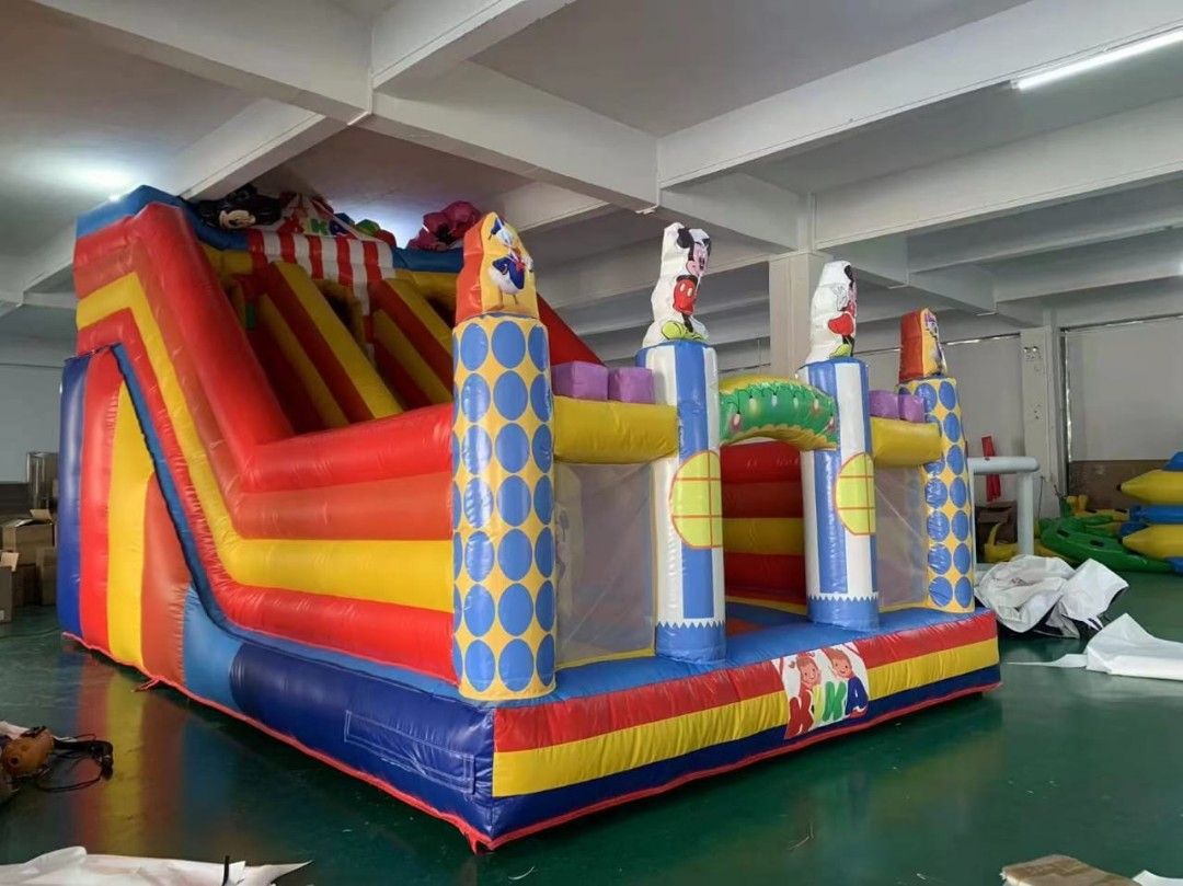 onhand Inflatable Bouncy Castle Slide playground (Category: Interactive Toys) located in Manila. Submitted by prettyme101395 (Listing ID 1464255185, Image 2). Description: - Awesome bouncy castle with slide! - Features popular Mickey Mouse and Mario themes. - Ideal for parties, events, and backyard entertainment. - Made with durable material for long-lasting fun. - Provides hours of entertainment for kids. - Great for personal use or rental busin