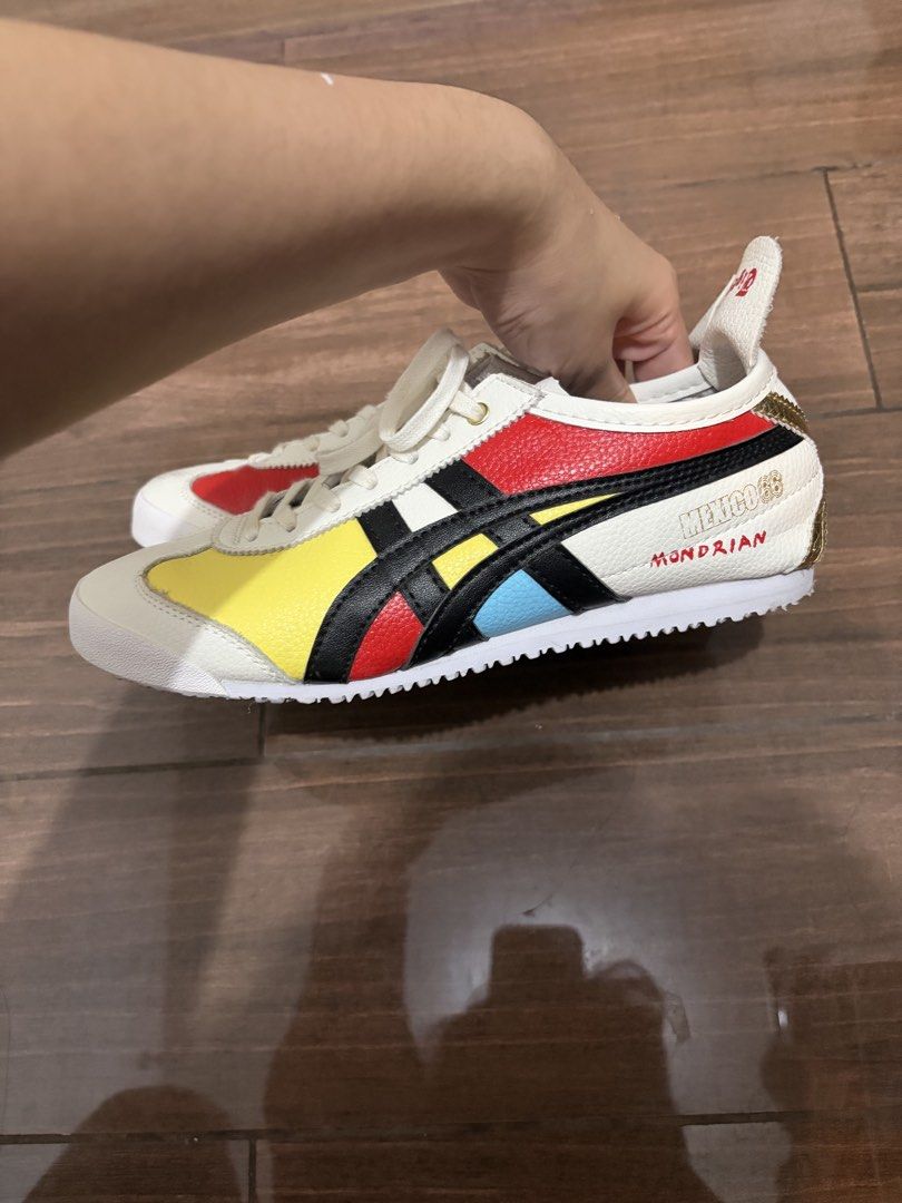 Onitsuka Tiger Mexico 66 Hand painted design (Category: Sneakers) located in Pasay City. Submitted by eudaimonia_0894 (Listing ID 1464235715, Image 2). Description: - Onitsuka Tiger Mexico 66 sneakers - Special Mondrian and Dialogue With collaboration design - Features iconic red, yellow, black, and blue color blocking - Gold detailing on the heel - Unique and eye-catching pair - Perfect for collectors or as a statement shoe This was only worn a 