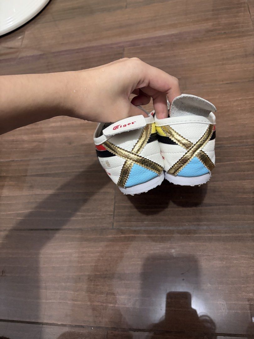 Onitsuka Tiger Mexico 66 Hand painted design (Category: Sneakers) located in Pasay City. Submitted by eudaimonia_0894 (Listing ID 1464235715, Image 3). Description: - Onitsuka Tiger Mexico 66 sneakers - Special Mondrian and Dialogue With collaboration design - Features iconic red, yellow, black, and blue color blocking - Gold detailing on the heel - Unique and eye-catching pair - Perfect for collectors or as a statement shoe This was only worn a 