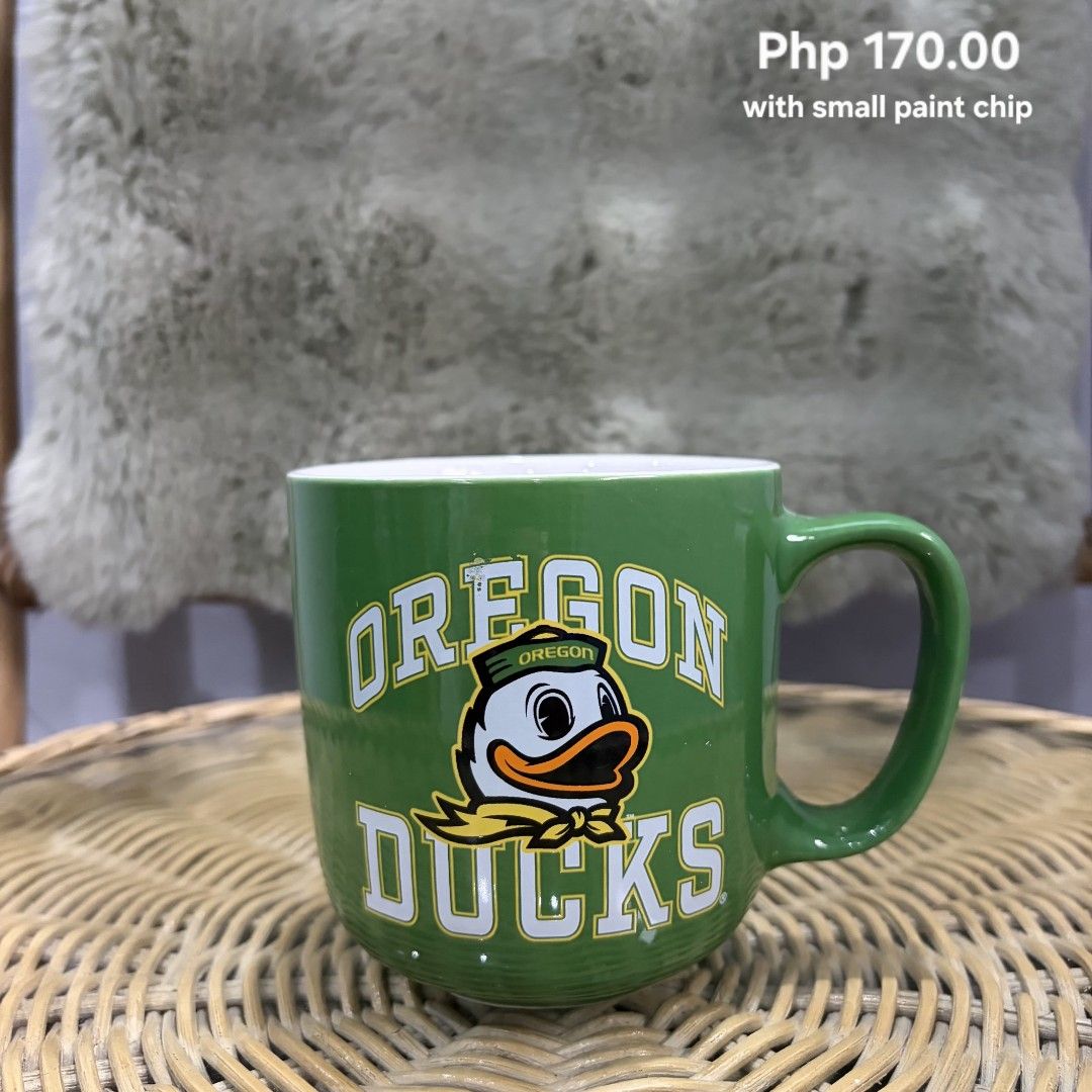 Oregon Ducks Mug (Category: Coffee & Tea Tableware) located in Pateros City. Submitted by lovealy_07 (Listing ID 1464262419, Image 1). Description: ✨ With small paint chip/imperfection paint chip are normal mostly because it’s a mall pullout Perfect for personal use or display. 💕 ✨ Still usable and functional ✨ Please check photos carefully before purchasing ✨ Sold as-is 🌸 Lalamove only 🌸 Color may vary due to Lighting 🌸 Marami po kasing naba