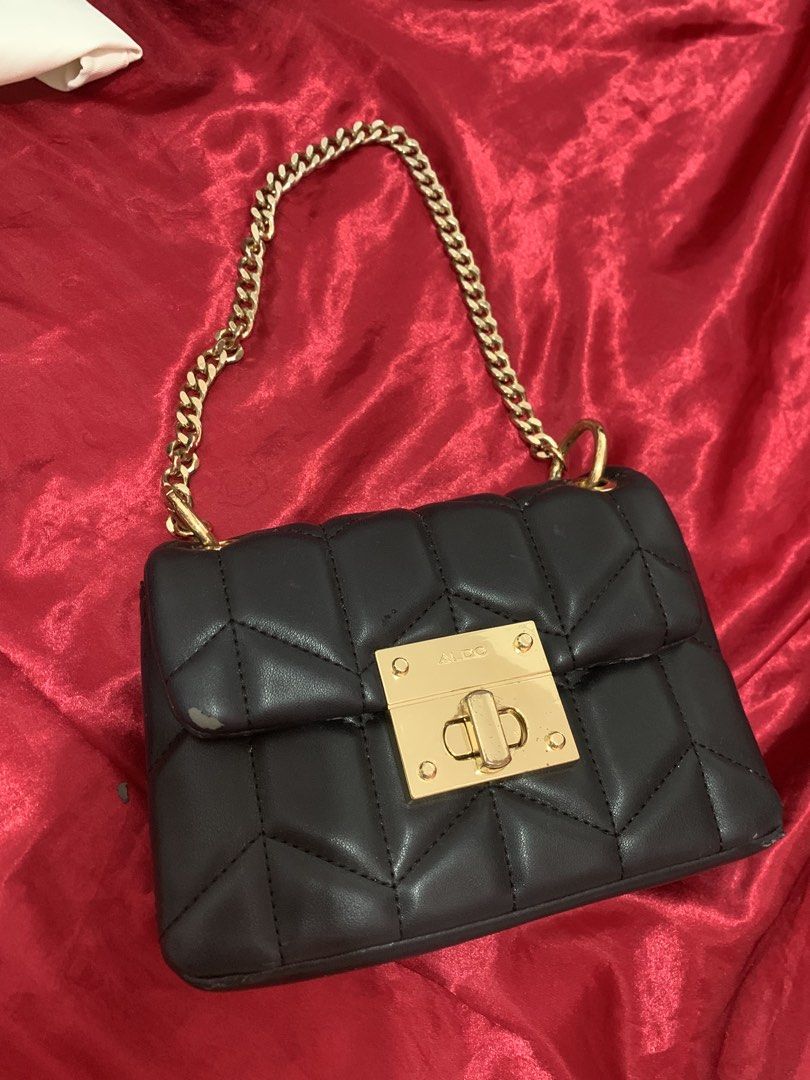 Original Aldo Sling Bag (Category: Cross-body Bags) located in Manila. Submitted by valerie_.27 (Listing ID 1464226593, Image 1). Description: Originally bought for 4k pesos Honest condition: Flaws on the metal gold lock, chipping leather on sides, inside is good as new! dont really use it so im selling.