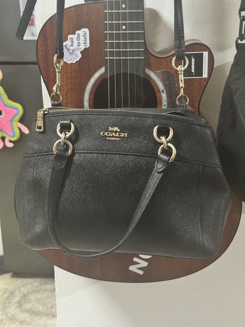 Original Coach Sling/Cross Body Bag (Category: Cross-body Bags) located in Manila. Submitted by maria200918 (Listing ID 1464212923, Image 1). Description: 👜 COACH Black Leather Tote Bag for Sale! 🖤 ✨ Classic and elegant Coach design ✨ Black textured leather with gold-tone hardware ✨ Spacious interior—perfect for everyday use or work ✨ Comes with shoulder straps ✨ Pre-loved; please see photos for actual condition, including signs of wear on the 