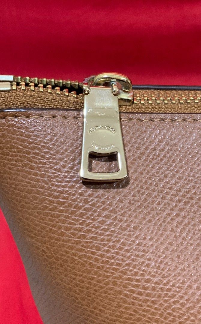 Original coach tote bag (Category: Tote Bags) located in Davao. Submitted by mj_2021 (Listing ID 1464209632, Image 2). Description: Bundle Coach tote bag only Original Coach Tote with gold hardware in good condition .