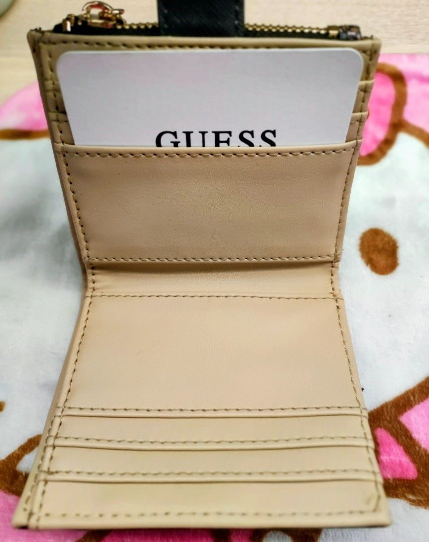 Original Guess Bifold Wallet (Category: Wallets & Card holders) located in General Trias. Submitted by dexieshop (Listing ID 1464156182, Image 3). Description: *Authentic Guess Bifold Short Wallet * Bought US *Payment via Gcash, No COD *Delivery via J&T, Grab or Lalamove *Shipping Fee c/o Buyer.