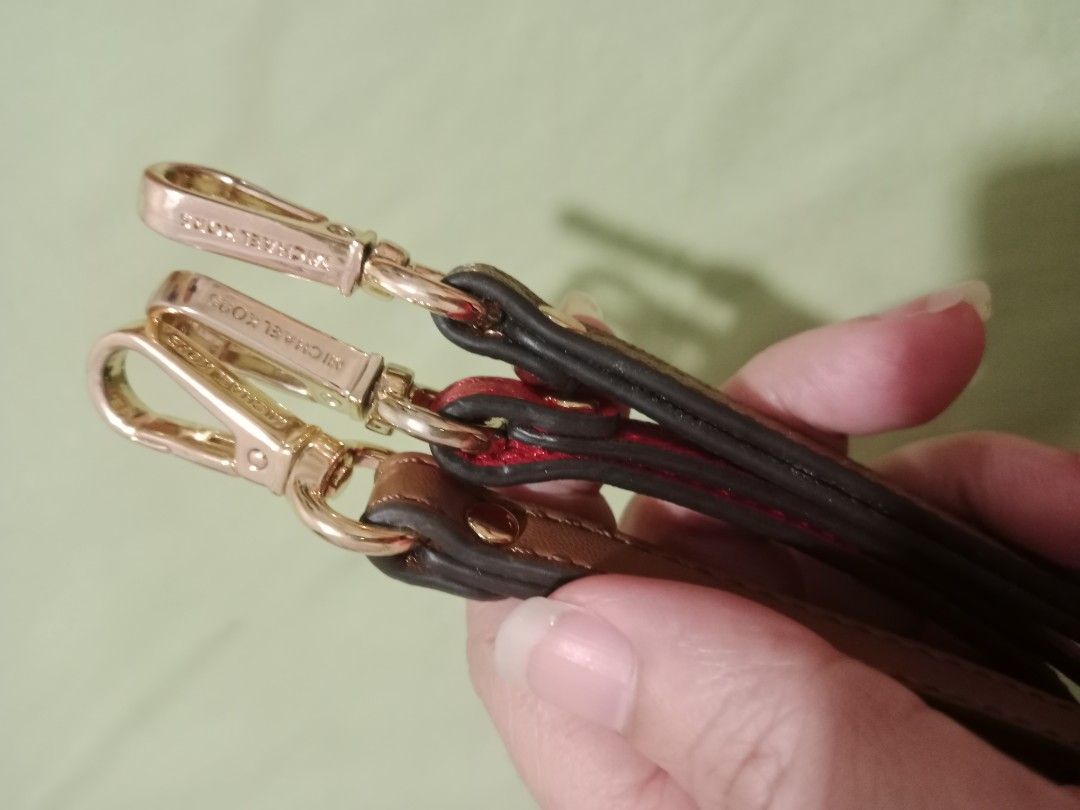 Original Michael Kors wristlet accessory 200 EACH (Category: Other Accessories) located in Manila. Submitted by idressupreloved (Listing ID 1464230549, Image 2). Description: 200 each color: red and brown.