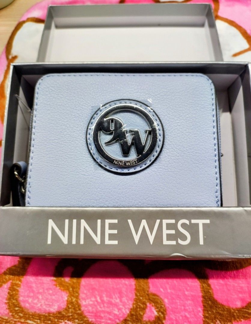 Original Nine West Short Wallet with Box (Category: Wallets & Card holders) located in General Trias. Submitted by dexieshop (Listing ID 1464159792, Image 2). Description: *Authentic Nine West Short Wallet *Color: Powder Blue * Bought US *Payment via Gcash, No COD *Delivery via J&T, Grab or Lalamove *Shipping Fee c/o Buyer.