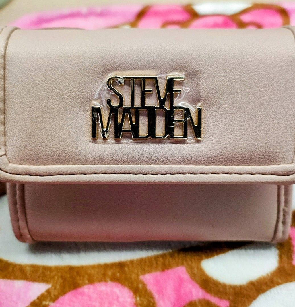 Original Steve Madden Short Wallet (Category: Wallets & Card holders) located in General Trias. Submitted by dexieshop (Listing ID 1464163059, Image 1). Description: *Authentic Steve Madden Short Wallet *Color: Baby Pink * Bought US *Payment via Gcash, No COD *Delivery via J&T, Grab or Lalamove *Shipping Fee c/o Buyer.