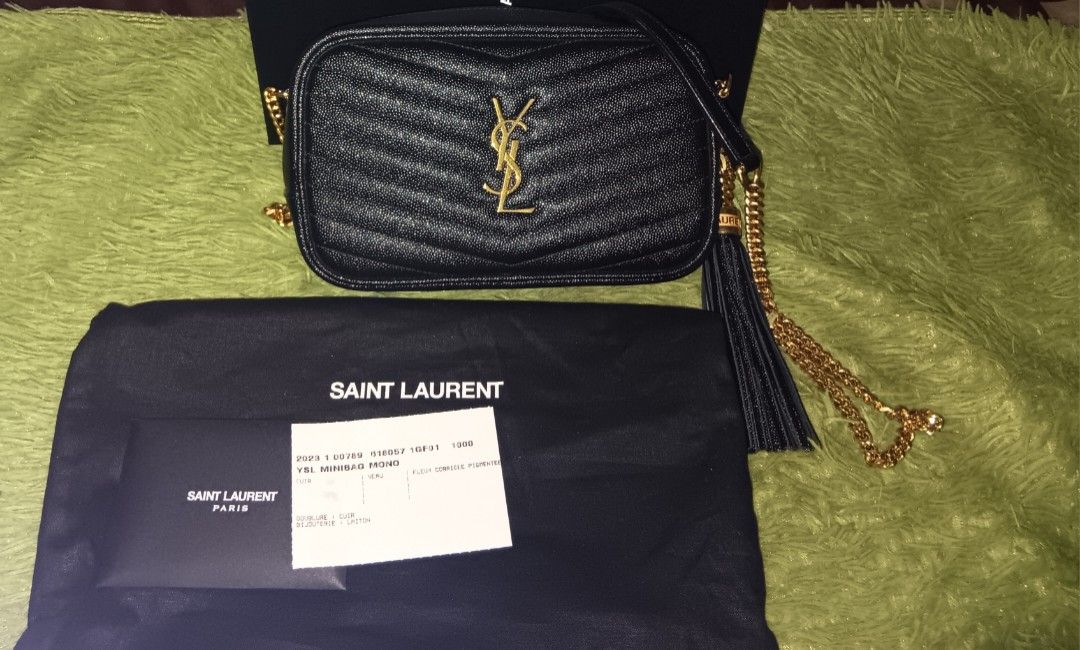 Original YSL mini Lou camera bag (Category: Luxury Bags & Wallets) located in Manila. Submitted by zstoreph (Listing ID 1464078707, Image 2). Description: - Authentic Saint Laurent camera bag calf leather grained material - Black chevron - Gold hardware - Signature YSL logo - Tassel detail - Chain strap - Comes with original box - Versatile for everyday or evening wear willing to meet up check first,This is good condition like new. 100% original.