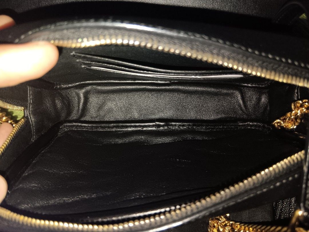 Original YSL mini Lou camera bag (Category: Luxury Bags & Wallets) located in Manila. Submitted by zstoreph (Listing ID 1464078707, Image 3). Description: - Authentic Saint Laurent camera bag calf leather grained material - Black chevron - Gold hardware - Signature YSL logo - Tassel detail - Chain strap - Comes with original box - Versatile for everyday or evening wear willing to meet up check first,This is good condition like new. 100% original.