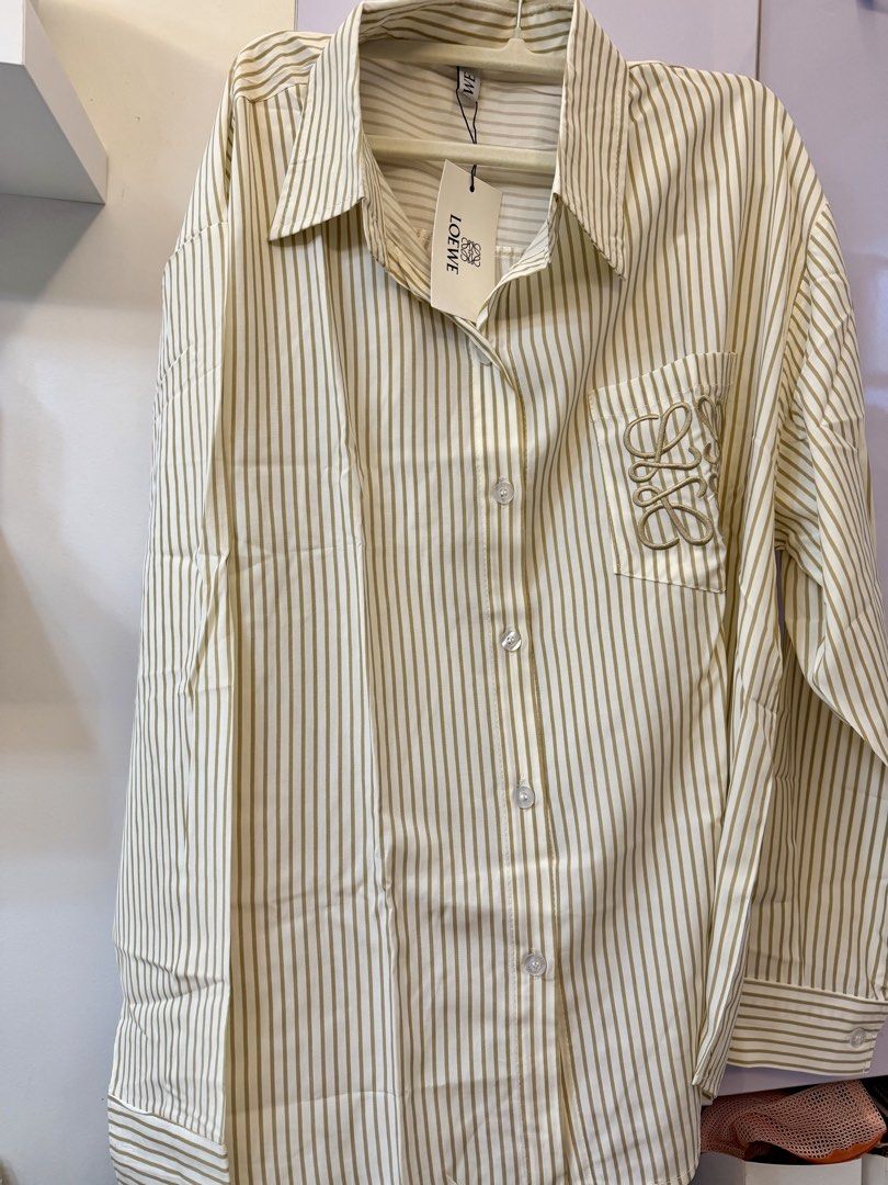 Oversized Polo (LOEWE Striped ) (Category: Shirts) located in Mandaluyong City. Submitted by jennliao (Listing ID 1464345378, Image 1). Description: BKK overisized Polo Bust up to 43".