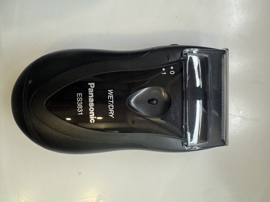 Panasonic ES3831 K Compact Wet/Dry Shaver (Category: Men's Grooming) located in Manila. Submitted by xenasales (Listing ID 1464144584, Image 3). Description: - Panasonic ES3831K Compact Shaver - Wet/Dry washable design for versatile use - Stainless-steel foil and blade for durability - Floating head easily follows facial contours - Battery operated (2 AA batteries required, not included) - Ergonomic design for a comfortable grip - Delivers a refr