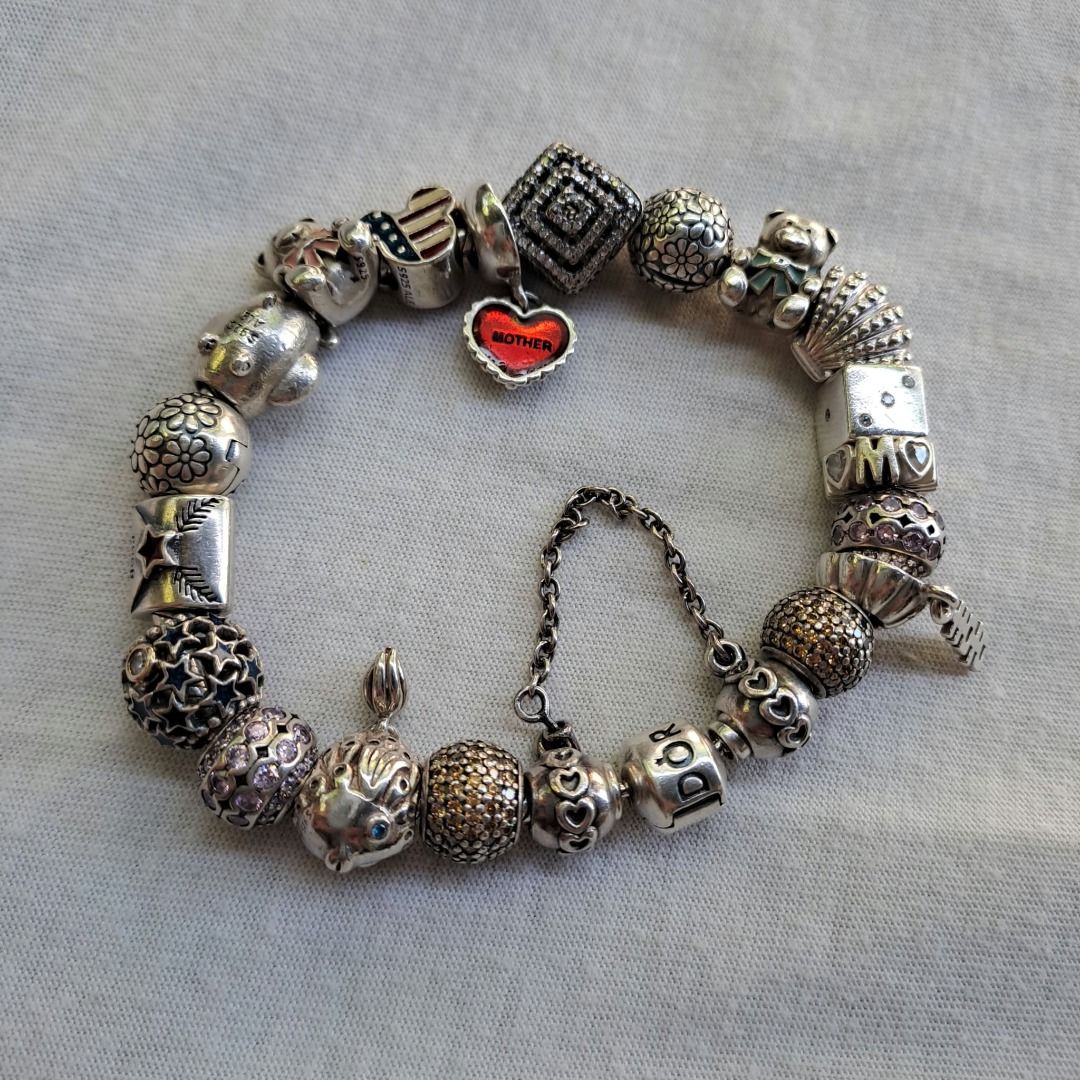 Pandora Style Charm Bracelet with Multiple Charms (Category: Bracelets) located in Pila. Submitted by ester_aurea (Listing ID 1464206088, Image 3). Description: All Authentic , with complete Charms good for 7- 7.5 wrist no inclusions natapon na po, but will provide box for safe shipping. With Big discounts if take all Bracelet - 2,500 Mother Heart Red - 2,100 Clear Effervescence Murano - 2,000 Splish Splash Angel Fish - 2,500 Letter to Santa - 1,