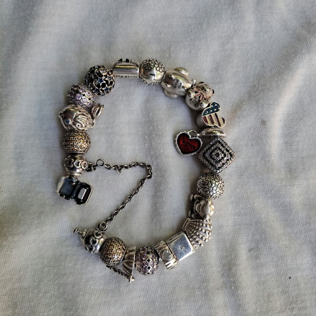 Pandora Style Charm Bracelet with Multiple Charms (Category: Bracelets) located in Pila. Submitted by ester_aurea (Listing ID 1464206088, Image 2). Description: All Authentic , with complete Charms good for 7- 7.5 wrist no inclusions natapon na po, but will provide box for safe shipping. With Big discounts if take all Bracelet - 2,500 Mother Heart Red - 2,100 Clear Effervescence Murano - 2,000 Splish Splash Angel Fish - 2,500 Letter to Santa - 1,
