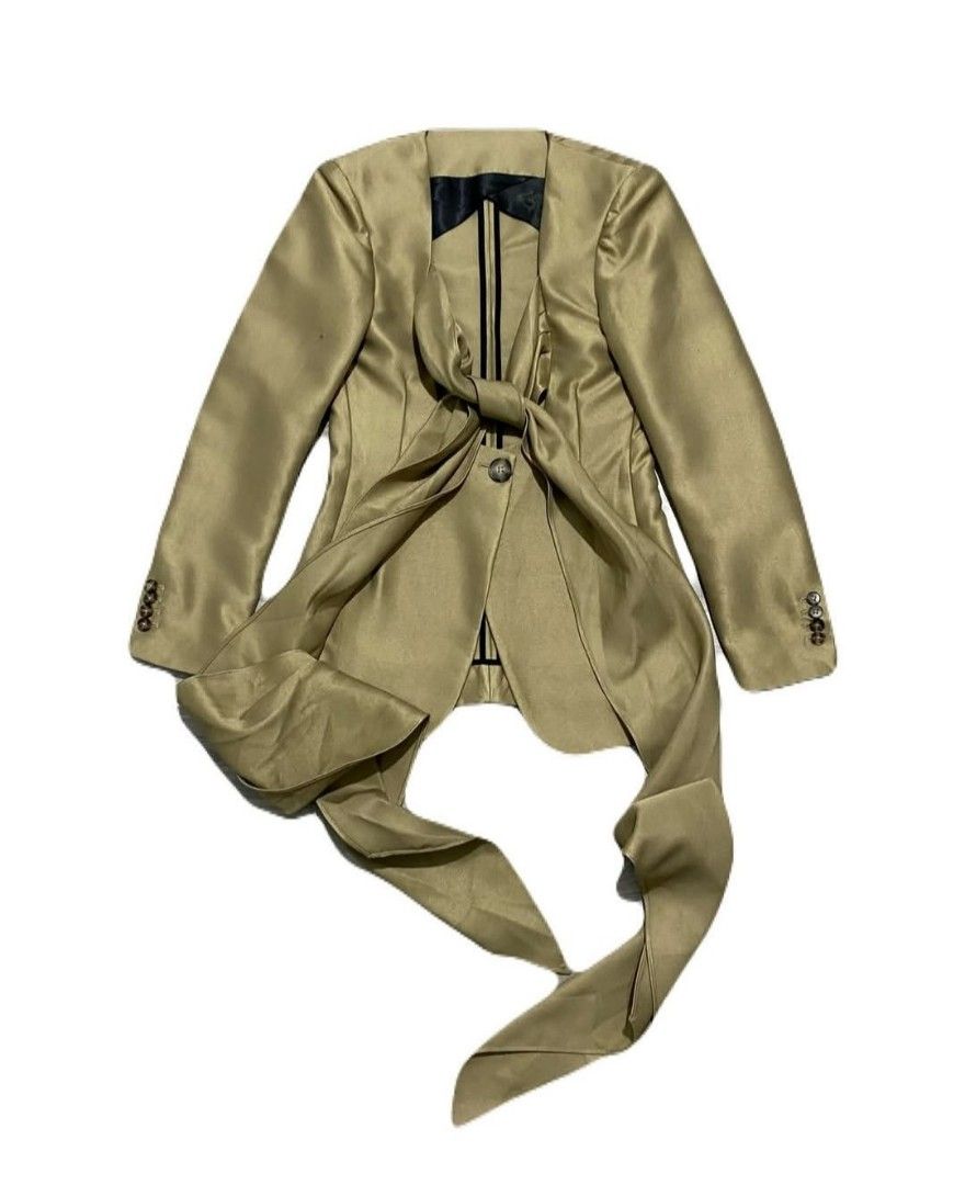 Petar Petrov Fall 2020 Archive Stylish Blazer Jacket (Category: Coats, Jackets and Outerwear) located in Manila. Submitted by jc.dingz1024 (Listing ID 1464247187, Image 2). Description: - Petar Petrov Fall 2020 Archive Blazer - Luxurious Gold Satin Material - Unique Tie Front Detail - Classic Button Closure - Measurements: Pit to Pit 16", Length 27", Waist 15" - Perfect Statement Piece for any Outfit.