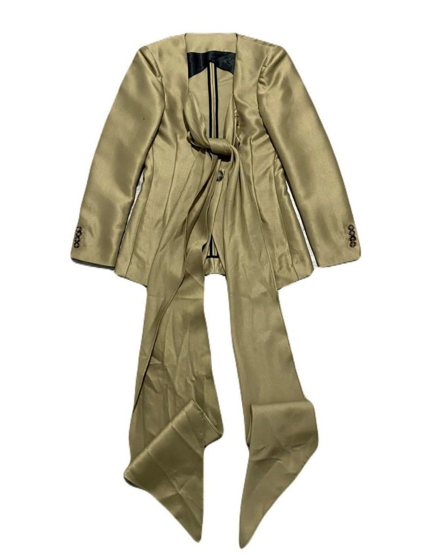 Petar Petrov Fall 2020 Archive Stylish Blazer Jacket (Category: Coats, Jackets and Outerwear) located in Manila. Submitted by jc.dingz1024 (Listing ID 1464247187, Image 3). Description: - Petar Petrov Fall 2020 Archive Blazer - Luxurious Gold Satin Material - Unique Tie Front Detail - Classic Button Closure - Measurements: Pit to Pit 16", Length 27", Waist 15" - Perfect Statement Piece for any Outfit.