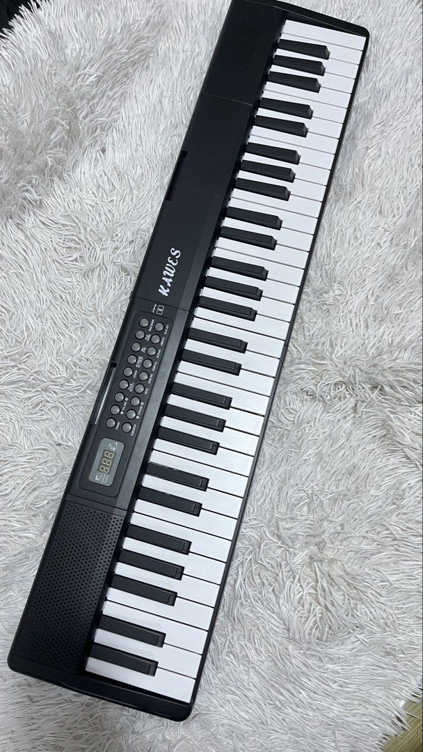 Piano Keyboard foldable w Bluetooth (Category: Musical Instruments) located in Manila. Submitted by joharahmauna_18 (Listing ID 1464148488, Image 1). Description: Kawes Bluetooth Piano Folding Keyboard , Portable Full Weighted Electric Piano keyboard (BD-686) 61keys Natutupi with Bluetooth nadin Brandnew w box yan no issue Inclusions: Box, Microphone, Audio-line ,Charging Cable, Music stand, Lyric/Sheet,Instruction , Keyboard Sticker Loc: NOVALIC