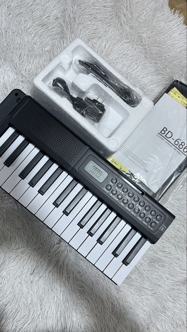 Piano Keyboard foldable w Bluetooth (Category: Musical Instruments) located in Manila. Submitted by joharahmauna_18 (Listing ID 1464148488, Image 2). Description: Kawes Bluetooth Piano Folding Keyboard , Portable Full Weighted Electric Piano keyboard (BD-686) 61keys Natutupi with Bluetooth nadin Brandnew w box yan no issue Inclusions: Box, Microphone, Audio-line ,Charging Cable, Music stand, Lyric/Sheet,Instruction , Keyboard Sticker Loc: NOVALIC