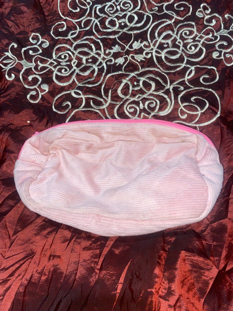 Pink Corduroy Pouch Bag (Category: Purses & Pouches) located in Manila. Submitted by reginemarquez412 (Listing ID 1464232162, Image 1). Description: - Adorable pink corduroy pouch - Secure zipper closure - Handy mesh interior pocket - Ideal for makeup, toiletries, or small essentials - Compact and portable for travel or daily carry.